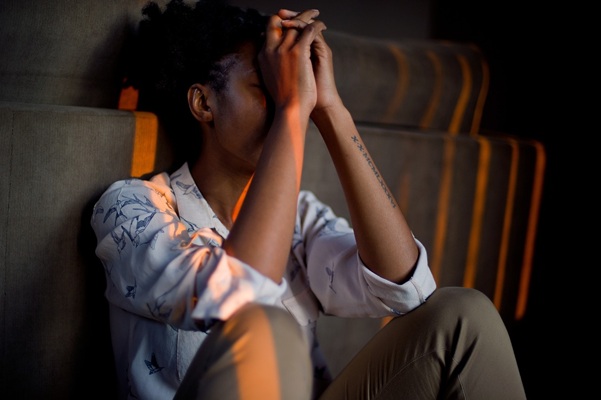 Sitting female upset about narcissistic relationship
